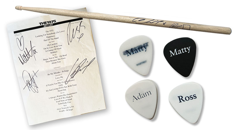 Signed Setlist from the opening show of the tour in Sacramento together with Matty, Ross, Adam guitar picks and George Drum Sticks.