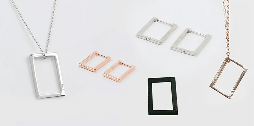 The 1975 Jewellery Collection. Rose Gold and Silver Necklaces, Rose Gold and Silver Earrings. Porcelain Rectangle Pendant.